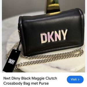 Black cross bag DKNY in gold and gold chain . Maggie clutch Nap